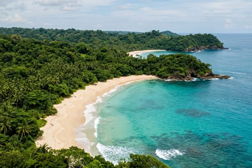 Coastal location in Indonesia with sandy beach, clear ocean water and natural surroundings suitable for a boutique hospitality property