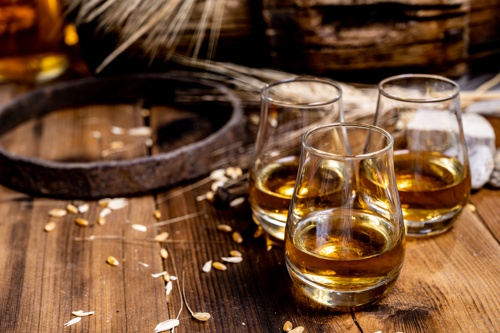 french whisky in tasting glass representing premium spirits in hospitality and terroir-driven production